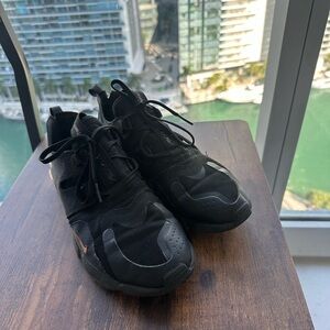 Nike Women’s Black and Rose Gold Sneakers